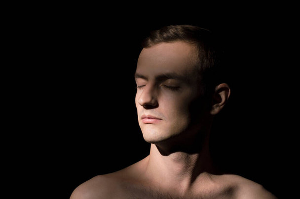 portrait of a guy, on a black background - Fotografie, Obrázek