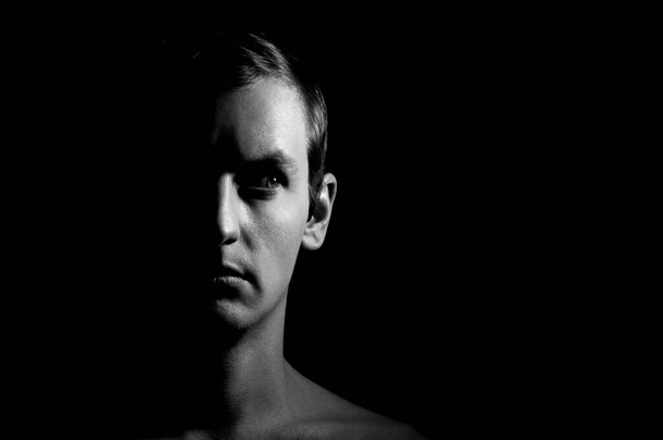 black and white dramatic portrait of a guy - Photo, Image
