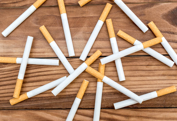 Cigarettes scattered on the table. Top view. - Foto, imagen