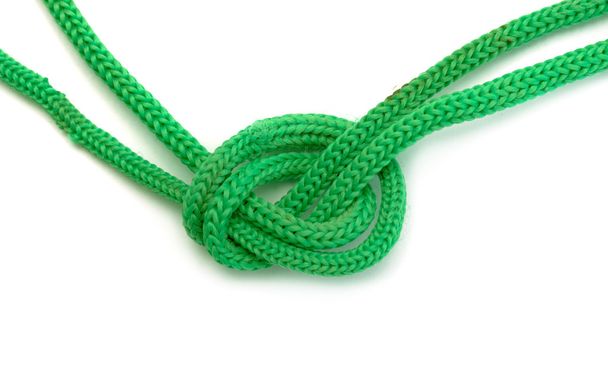 Зелена мотузка крупним планом на білому тлі
 - Фото, зображення