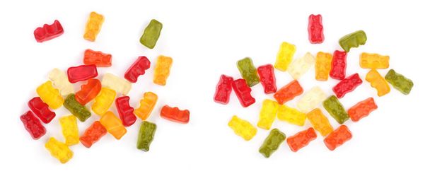 Kleurrijk eten gummy beren jelly candy geïsoleerd op een witte achtergrond. Bovenaanzicht. Plat leggen. - Foto, afbeelding