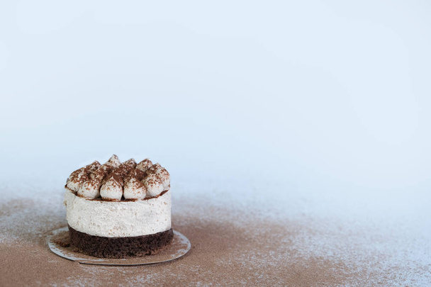 Portioned tiramisu cake. Airy creamy curd biscuit sweetness.Dessert without sugar, low-calorie. Craft pastry shop, baking recipe - Fotografie, Obrázek