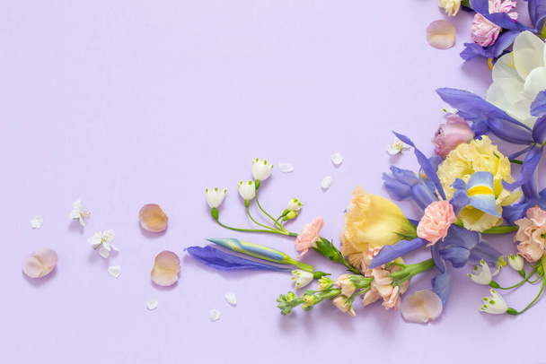 beautiful spring flowers on paper background - Фото, зображення