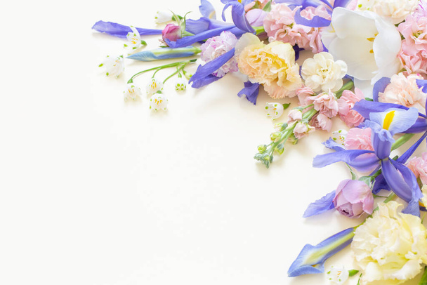 beautiful spring flowers on pastel background - Fotó, kép