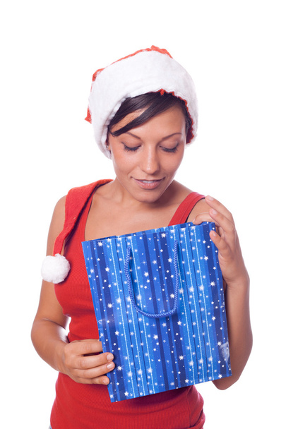 Sexy Woman with Santa Hat and Christmas Gifts - Foto, afbeelding