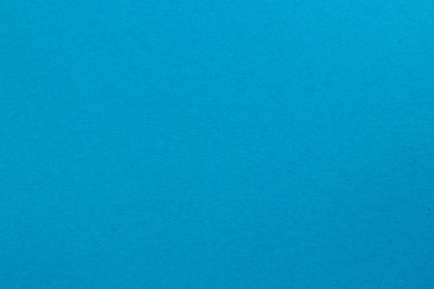Pacific blue colored tinted paper sheet background. - Photo, Image