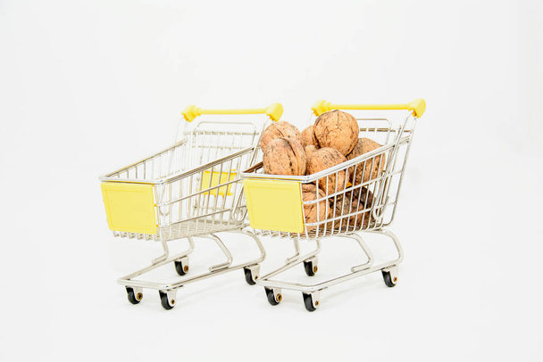 shopping cart with nuts and other fruits - Photo, Image