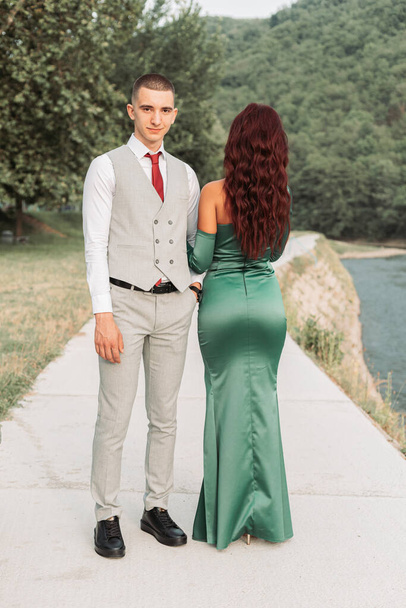 Young teenage couple dressed up for the prom - Fotó, kép