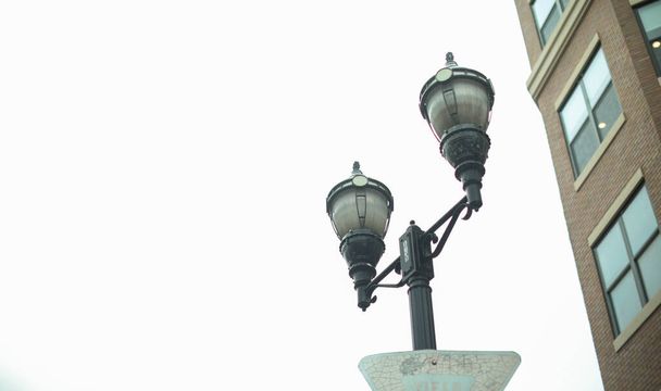 street lamp on the background of the building - Foto, imagen