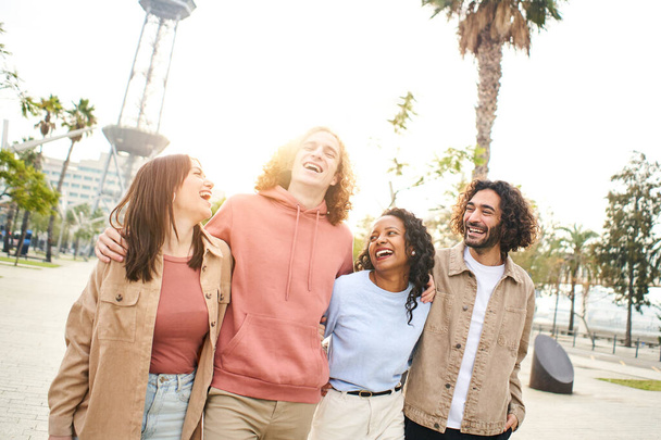 Multiracial group of friends walk in the city and having fun. High quality photo - Photo, Image