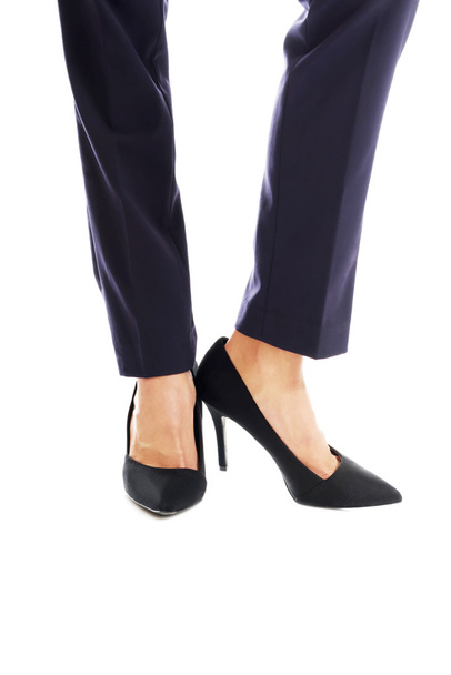 Businesswoman's slim legs in high heels - Foto, Imagem