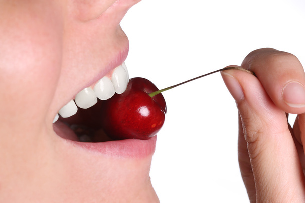 Cherry in female lips - Fotografie, Obrázek