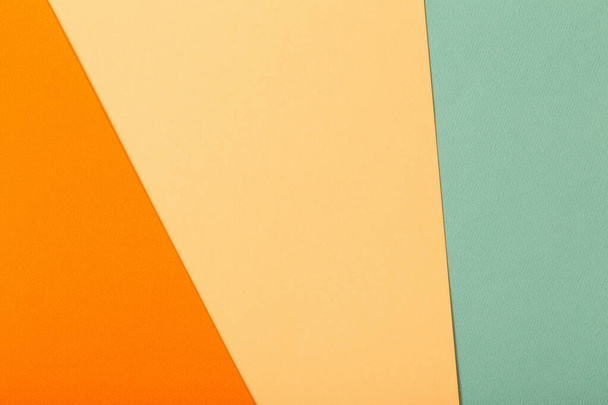 multi-colored paper background from several sheets of cardboard - Fotografie, Obrázek