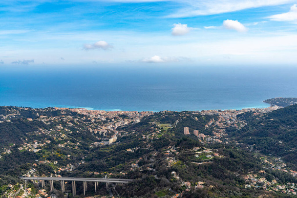 Landscape view of the Mediterranean Coast and the towns of Menton and Cape Martin in southern France with the La Provencal Highway - Valokuva, kuva