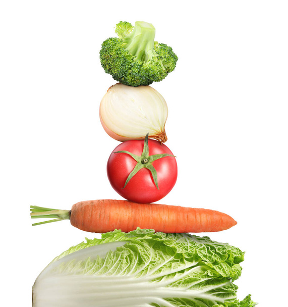 Stack of different fresh vegetables on white background - Photo, Image