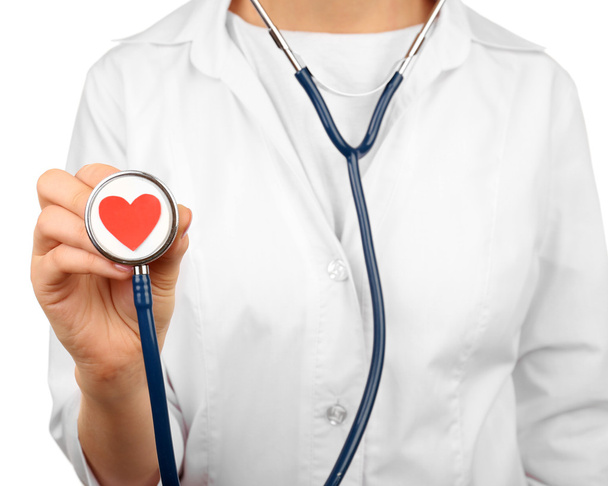Stethoscope with heart in doctor hands - Foto, afbeelding