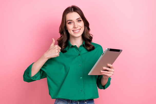 Photo of gorgeous positive person hold tablet demonstrate thumb up isolated on pink color background. - Φωτογραφία, εικόνα