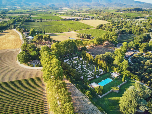 Aerial scenic Mediterranean landscape with cypresses, olive trees and vineyards in Provence, Southern France - Fotó, kép