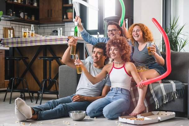 group of friends watching football, drinking beer - Photo, Image