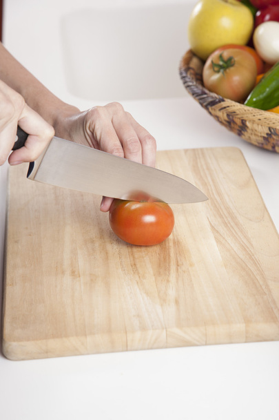 snijden tomaat - Foto, afbeelding