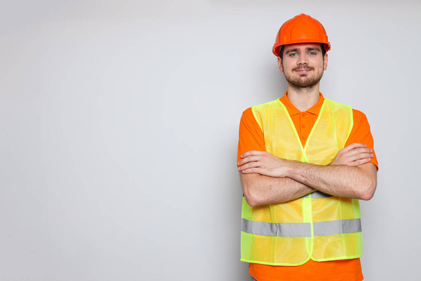 Young man civil engineer in safety hat - Φωτογραφία, εικόνα