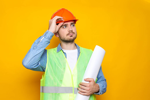 Young man civil engineer in safety hat - Photo, Image