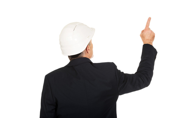 Businessman pointing up - Photo, Image