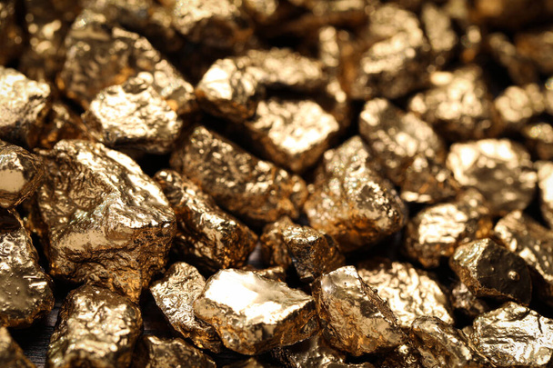 Pile of gold nuggets as background, closeup - Φωτογραφία, εικόνα