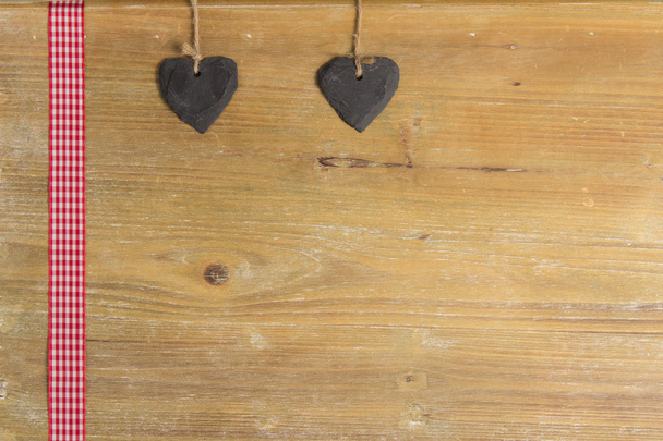 Heart of slate on a wood panel. - Photo, Image
