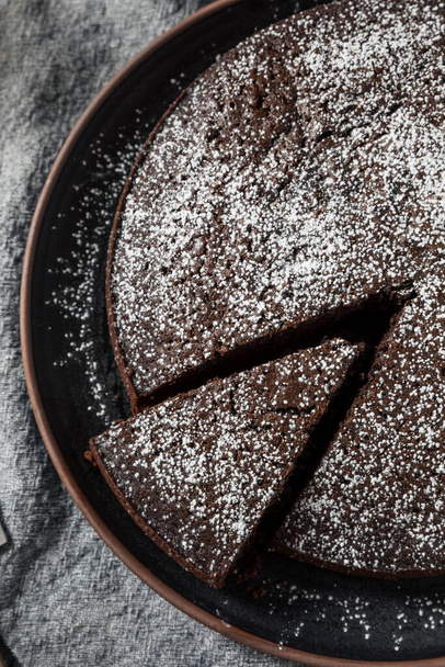Baked Chocolate Olive Oil Cake with Powdered Sugar - Photo, image