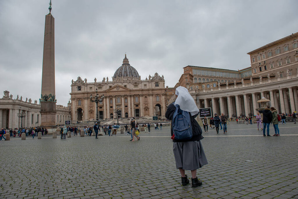 Rome Italy 14 March 2020:Piazza san Pietro People in queue waiting to enter St. Peter's Basilica - 写真・画像