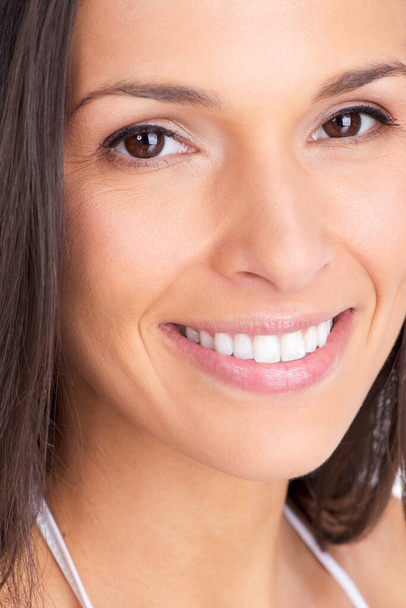 Flawless perfection. Closeup studio portrait of a beautiful woman with a radiant smile - Fotografie, Obrázek