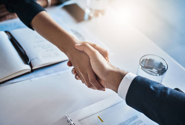 Lets create new opportunities together. Closeup shot of two unrecognizable businesspeople shaking hands in an office - Foto, immagini