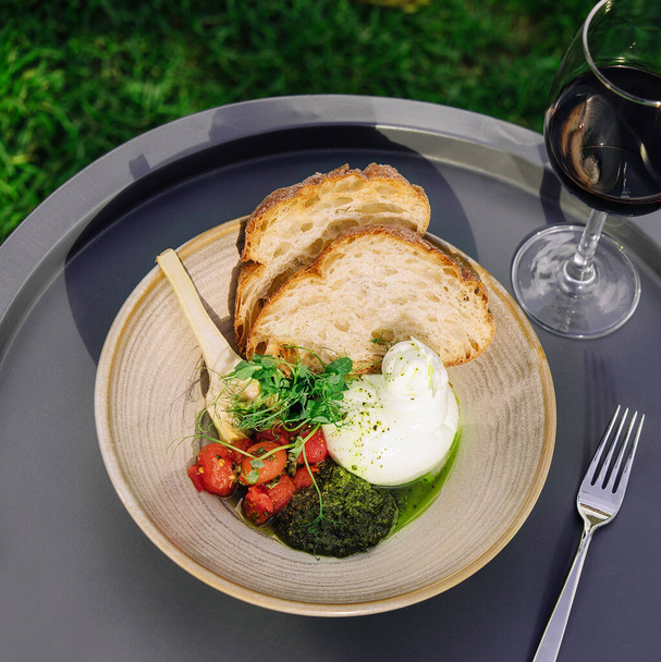 Burrata Cheese with Nutless Pesto and Roasted Tomatoes - Photo, Image