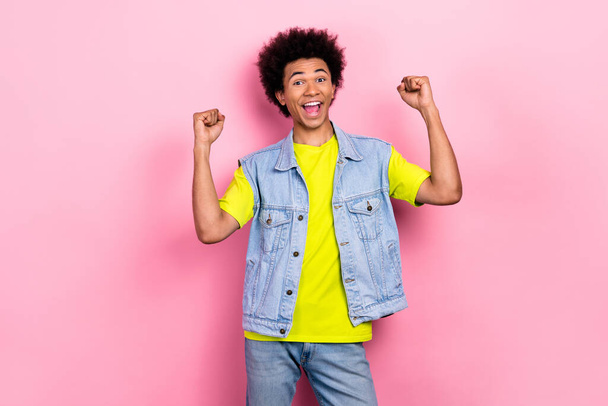 Photo of positive delighted man raise fists luck accomplishment triumph isolated on pink color background. - Fotografie, Obrázek