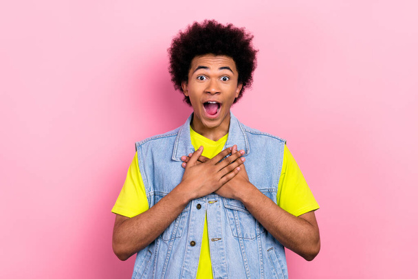 Photo of astonished positive young man open mouth arms touch chest isolated on pink color background. - Фото, зображення