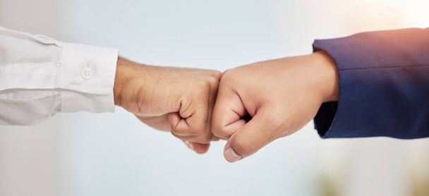 Business people, hands and fist bump in teamwork agreement for good job, winning or success at office. Employees touching hands or fists for team support, win or collaboration together at workplace. - Fotoğraf, Görsel