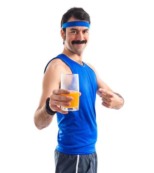 Вінтажний спортсмен з апельсиновим соком
 - Фото, зображення