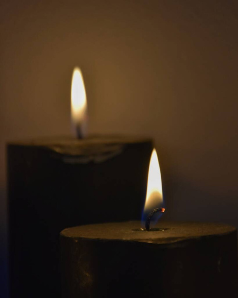 burning candle on a dark background - Photo, image
