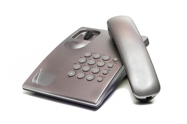téléphone fixe gris sur fond blanc
 - Photo, image