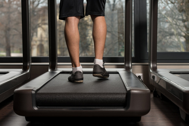 Man Feet On Treadmill - Fotó, kép