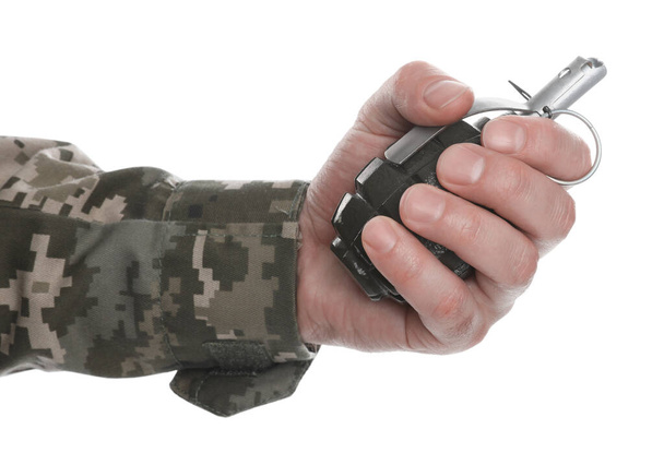 Soldier holding hand grenade on white background, closeup. Military service - Zdjęcie, obraz