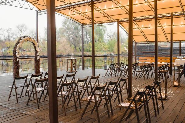 covered area for outdoor ceremony, chairs. High quality photo - Photo, image