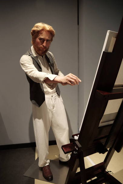 BUKOVEL, UKRAINE, OCTOBER 5, 2022: Wax figure of Vincent Willem van Gogh. Dutch Post-Impressionist painter, posthumously became one of most famous and influential figures in Western art history - 写真・画像