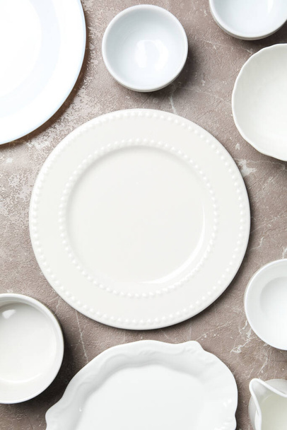 Minimal table setting with blank dish, top view - Photo, Image