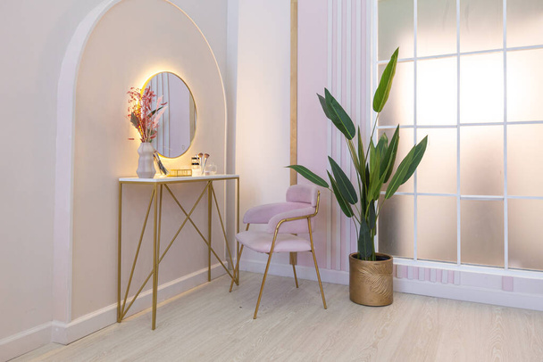 beauty corner in luxurious modern expensive spacious light stylish apartment. upholstered furniture and decorative lighting, soft pastel colors and cozy atmosphere - Foto, Bild