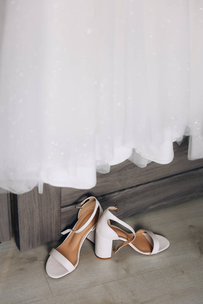 stylish white bridal high heel shoes, isolated. High quality photo - 写真・画像