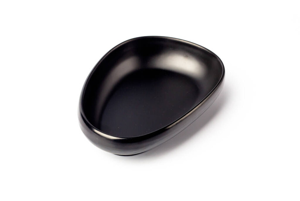 Black isolated ceramic bowl on the white background isolated - Foto, Imagem
