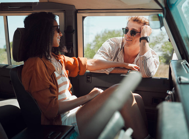 Travel, road trip and couple with love for summer journey, holiday vacation in safari or countryside adventure with sunglasses in caravan. Happy young people, friends or driver woman in nature desert. - Photo, Image