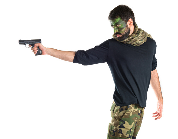 Soldat tirant avec un pistolet
  - Photo, image
